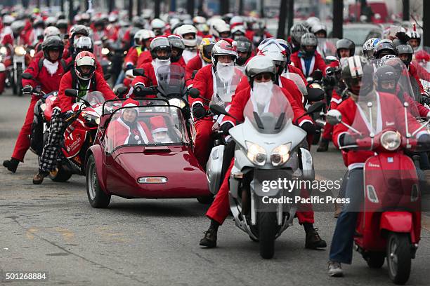 Thousands of people dressed as Santa Claus took part in the sixth edition of "Un Babbo Natale in Moto". The streets of Torino have been colored by a...