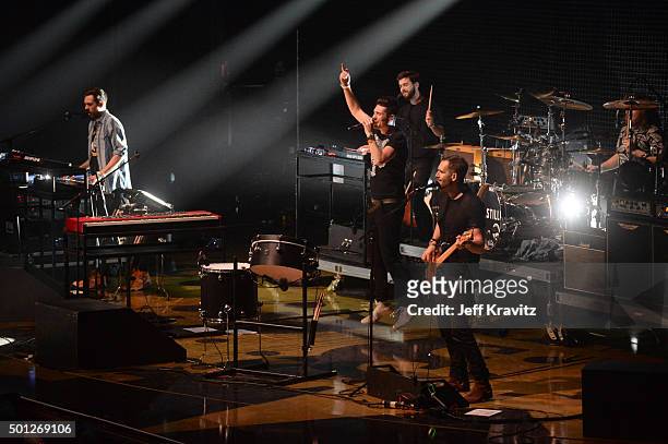 Musicians Kyle J Simmons, Dan Smith, Chris 'Woody' Wood and Will Farquarson of Bastille perform onstage during 106.7 KROQ Almost Acoustic Christmas...