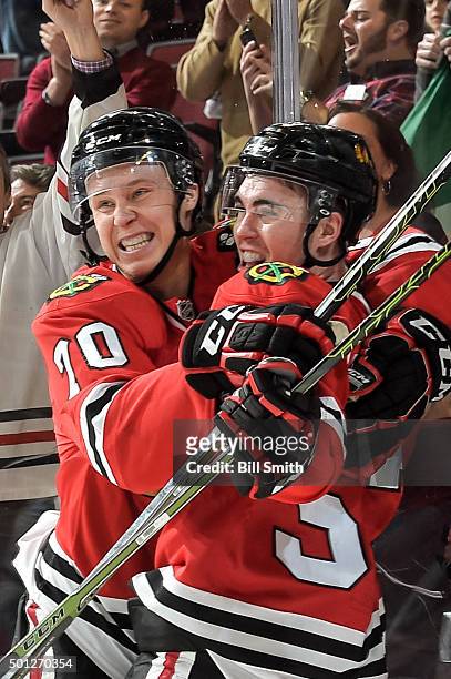 Dennis Rasmussen and Brandon Mashinter of the Chicago Blackhawks celebrate after Mashinter scored against the Vancouver Canucks in the third period...