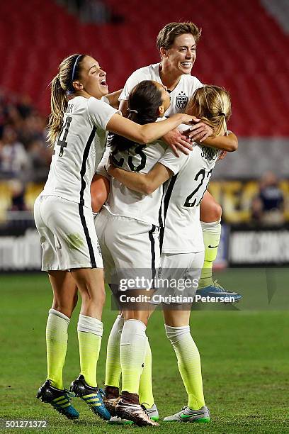 Morgan Brian, Christen Press, Meghan Klingenberg and Emily Scott of the United States celebrate after Press scored a second half goal against China...