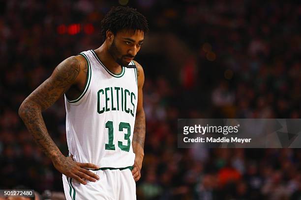 James Young of the Boston Celtics looks on during the second quarteragainst the Golden State Warriors at TD Garden on December 11, 2015 in Boston,...