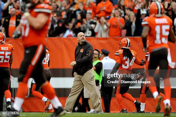 Head coach Mike Pettine of the Cleveland Browns walks back to the sideline after celebrating a touchdown during a game against the San Francisco...