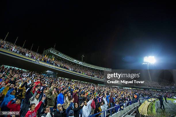 Fans of Pumas cheer during the final second leg match between Pumas UNAM and Tigres UANL as part of the Apertura 2015 Liga MX at Olimpico...