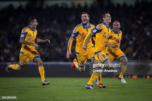 Players of Tigres celebrate victory with the trophy after the Final Match of the Liga MX between Pumas vs Tigres, at the Estadio Olimpico in Mexico...