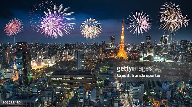 tokyo skyline with the tokyo tower for the new year - happy new year 2016 stock pictures, royalty-free photos & images