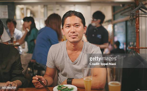 man enjoying beer and food. - japanese fat man bildbanksfoton och bilder