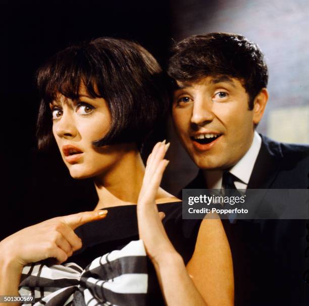 English comedian Jimmy Tarbuck and actress Amanda Barrie on the set of the television series 'The Jimmy Tarbuck Show' in 1966.