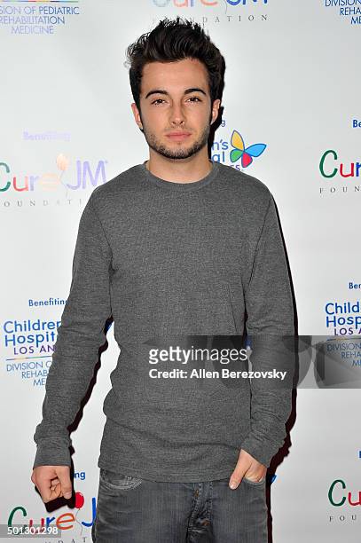 Actor Noland Ammon attends the 12th Annual Holiday Toy Drive hosted by CURE JM benefiting Children's Hospital Of Los Angeles at Avalon on December...
