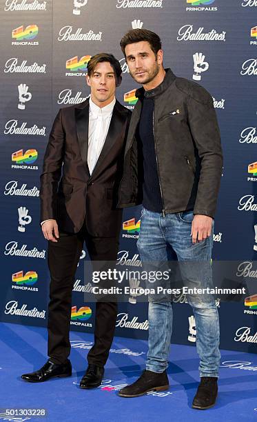 Basty Pinero and Adrian Lastra attend the 40 Principales Awards 2015 photocall at Barclaycard Center on December 11, 2015 in Madrid, Spain.