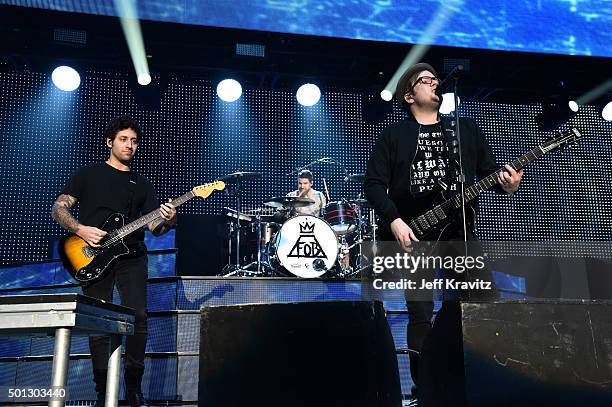 Musicians Joe Trohman, Patrick Stump and Andy Hurley of Fall Out Boy perform at The Forum on December 13, 2015 in Inglewood, California.