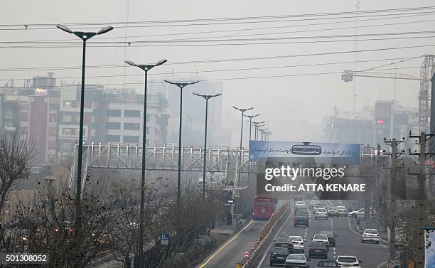 General view taken from the west of Tehran shows the heavily polluted skyline of the Iranian capital on December 14, 2015. Air pollution in Iran's...