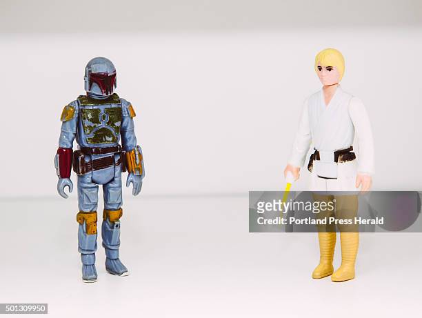 Star Wars action figures, Boba Fett and Luke Skywalker, apart of Tom Long's collection at his home in Portland, ME on Wednesday, December 2, 2015.
