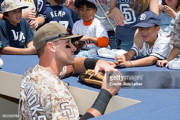 Will Middlebrooks of the San Diego Padres signs autographs before the game against the Colorado Rockies at Petco Park on Sunday, May 3, 2015 in San...