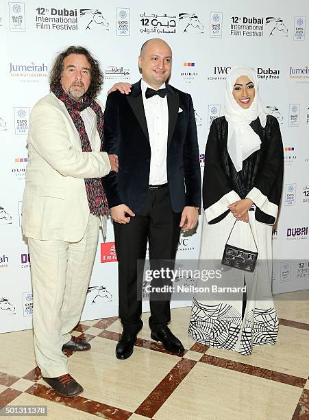 Filmmakers Ovidio Salazar, Mazen al Khayrat and Nahla al Fahad attend "The Tainted Veil" premiere during day six of the 12th annual Dubai...