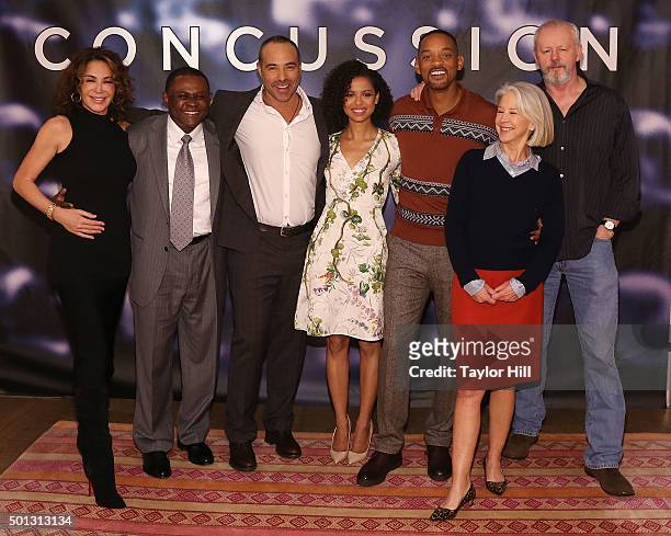 Giannina Scott, Dr. Bennet Omalu, Peter Landesman, Gugu Mbatha-Raw, Will Smith, Elizabeth Cantillon, and David Morse attend a photocall for...