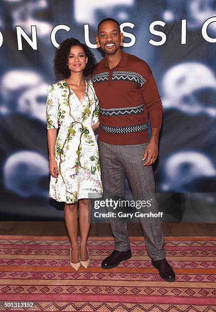 Actors Gugu Mbatha-Raw and Will Smith attend the "Concussion" cast photo call at Crosby Street Hotel on December 14, 2015 in New York City.