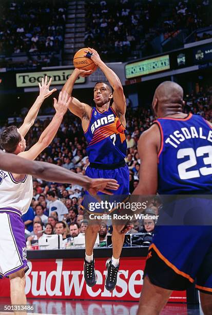 Kevin Johnson of the Phoenix Suns shoots against the Sacramento Kings circa 1997 at Arco Arena in Sacramento, California. NOTE TO USER: User...