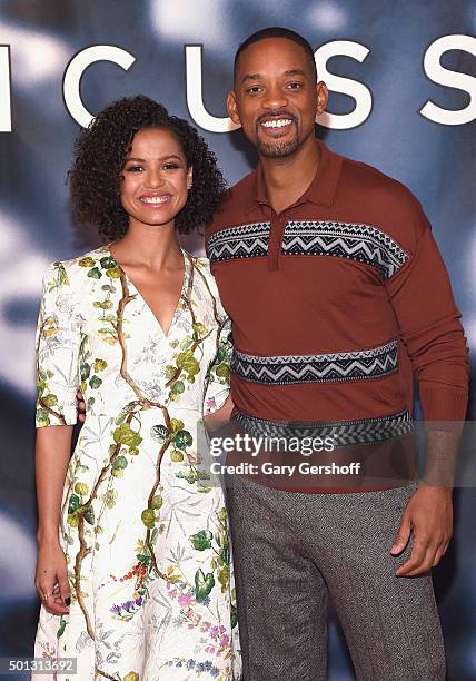 Actors Gugu Mbatha-Raw and Will Smith attend the "Concussion" cast photo call at Crosby Street Hotel on December 14, 2015 in New York City.