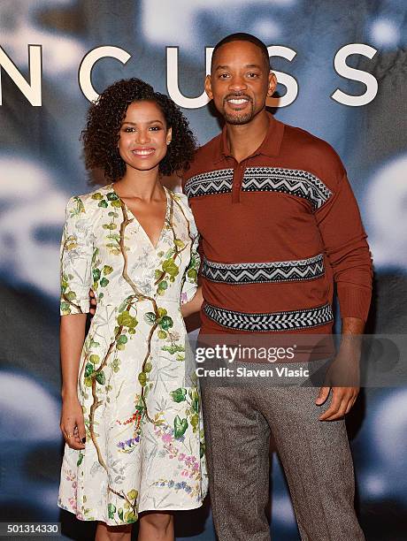 Actors Gugu Mbatha-Raw and Will Smith attend "Concussion" cast photo call at Crosby Street Hotel on December 14, 2015 in New York City.