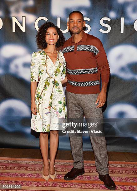 Actors Gugu Mbatha-Raw and Will smith attend "Concussion" cast photo call at Crosby Street Hotel on December 14, 2015 in New York City.