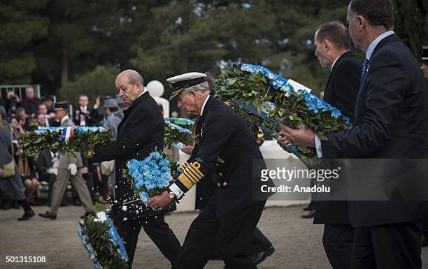 Prince Charles of Wales drops the wreath which he was about to place on the French National War Cemetery and memorial and wreath falls to pieces...