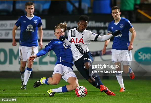 Shaquile Coulthirst of Spurs U21s is tackled by Tom Davies of Everton U21s during the Barclays U21 Premier League match between Everton U21 and...