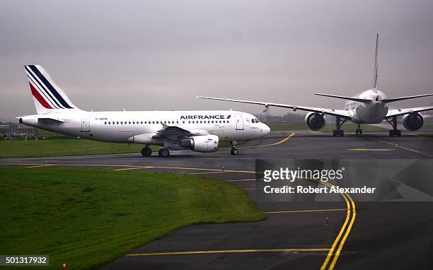 An Air France passenger aircraft taxis toward the runway at Charles de Gaulle Airport in Paris, France.