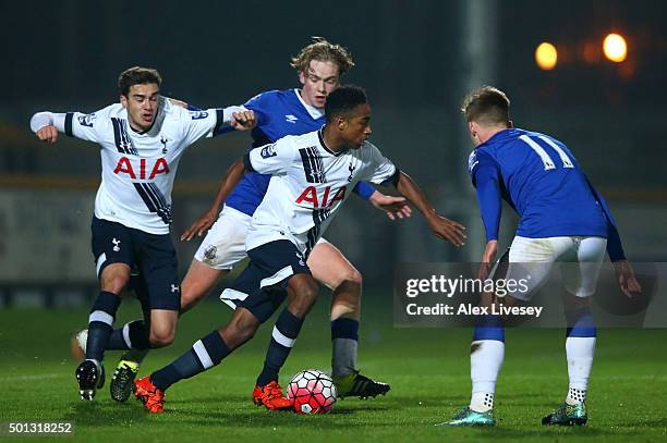 Kyle Walker-Peters of Spurs U21s is closed down by Tom Davies and Conor McAleny of Everton U21s during the Barclays U21 Premier League match between...