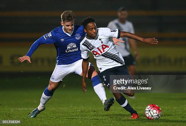 Kyle Walker-Peters of Spurs U21s is challenged by Conor McAleny of Everton U21s during the Barclays U21 Premier League match between Everton U21 and...