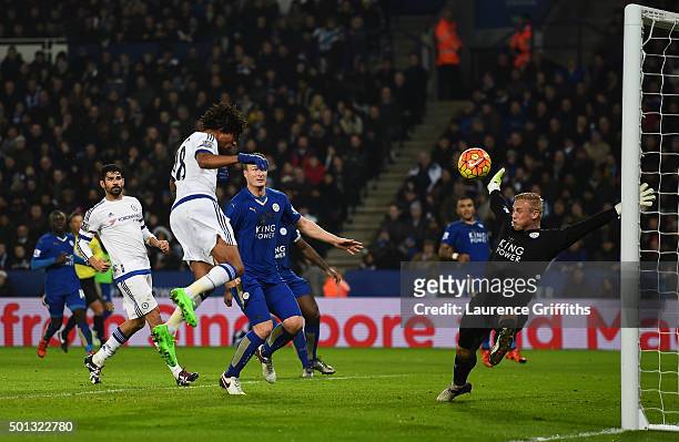 Loic Remy of Chelsea scores a goal past the outstretched Kasper Schmeichel of Leicester City during the Barclays Premier League match between...