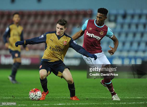 Dan Crowley of Arsenal takes on Reece Oxford of West Ham during match between West Ham United U21 and Arsenal U21 at Boleyn Ground on December 14,...