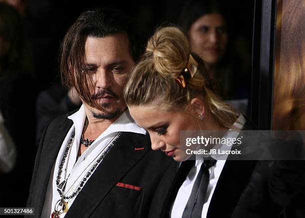 Johnny Depp and Amber Heard attend the premiere of Focus Features' 'The Danish Girl' at Westwood Village Theatre on November 21, 2015 in Westwood,...