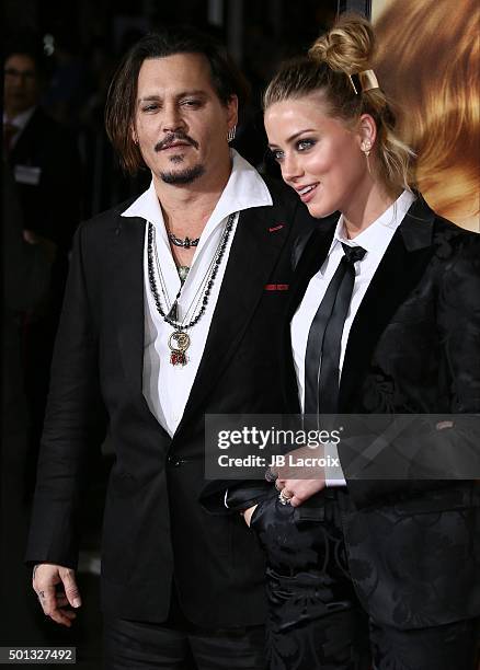 Johnny Depp and Amber Heard attend the premiere of Focus Features' 'The Danish Girl' at Westwood Village Theatre on November 21, 2015 in Westwood,...