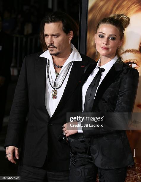 Johnny Depp and Amber Heard attend the premiere of Focus Features' 'The Danish Girl' at Westwood Village Theatre on November 21, 2015 in Westwood,...