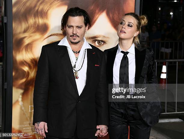 Johnny Depp and Amber Heard attend the premiere of Focus Features' 'The Danish Girl' at Westwood Village Theatre on November 21, 2015 in Westwood,...