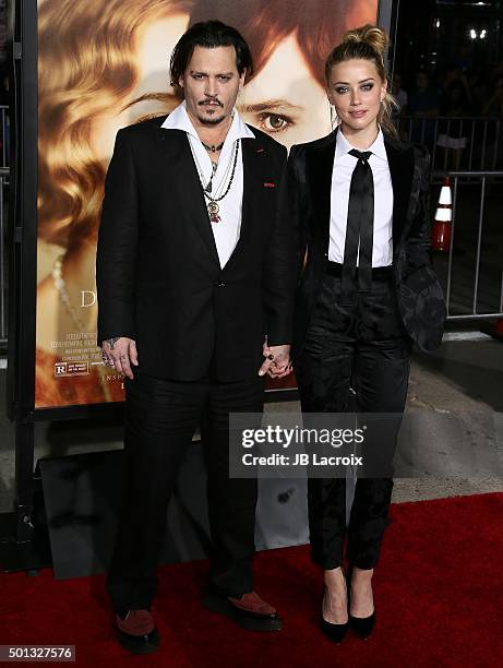 Johnny Depp and Amber Heard attend the premiere of Focus Features' 'The Danish Girl' at Westwood Village Theatre on November 21, 2015 in Westwood,...