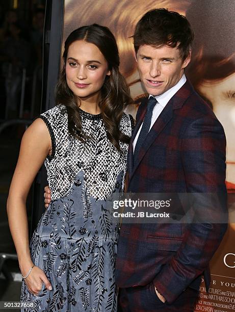 Eddie Redmayne and Alicia Vikander attend the premiere of Focus Features' 'The Danish Girl' at Westwood Village Theatre on November 21, 2015 in...