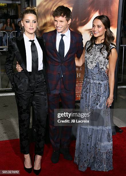 Amber Heard, Eddie Redmayne and Alicia Vikander attend the premiere of Focus Features' 'The Danish Girl' at Westwood Village Theatre on November 21,...