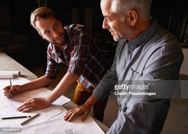 with men it's all about getting the measurements right - family business generations stock pictures, royalty-free photos & images
