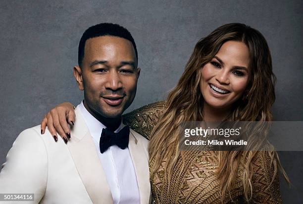 Singer John Legend poses with wife and model Chrissy Teigen for a portrait at the Sinatra 100: An All-Star GRAMMY Concert at Wynn Las Vegas on...