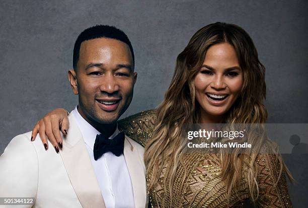 Singer John Legend poses with wife and model Chrissy Teigen for a portrait at the Sinatra 100: An All-Star GRAMMY Concert at Wynn Las Vegas on...