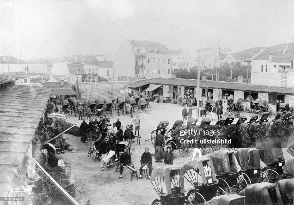 China: Qingdao (German colony Jiaozhou Bay), rickshaw depot. - probably in the 1910s