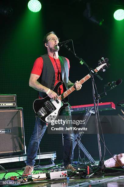 Musician Scott Shriner of Weezer performs onstage during 106.7 KROQ Almost Acoustic Christmas 2015 at The Forum on December 12, 2015 in Inglewood,...