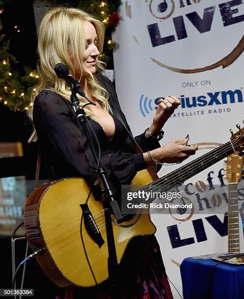 Jewell borrows a finger nail clipper from audience member while performing at "Let It Snow" SiriusXM Acoustic Christmas With Jewel And Shawn Mullins...