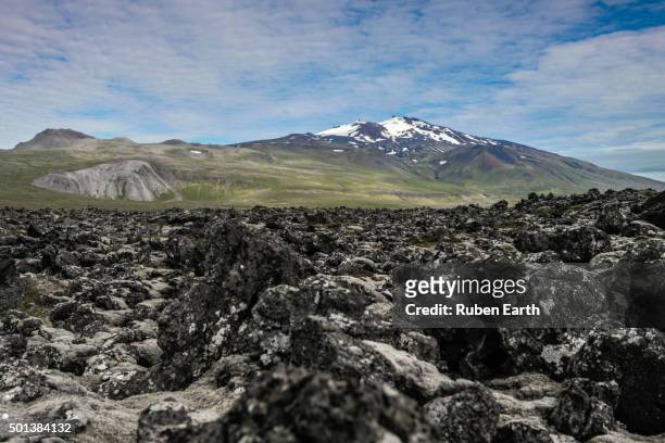 volcanic rocks and the snaefellsjoekull volcano - snaefellsjokull stock pictures, royalty-free photos & images