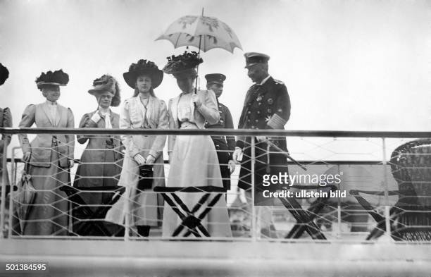 Wilhelm II. German Emperor 1888-1918 King of Prussia The royal family watching the rowing regatta in Berlin - Gruenau from board of the yacht...