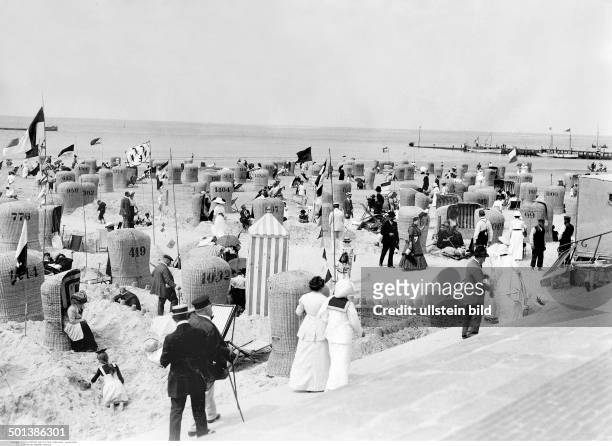 Norderney island, North Sea: wicker beach chairs on the beach - in the 1910s