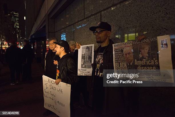 Activist, including Nicholas Heywood, Sr. Participate in a rally opposite the Ziegfeld Theater before the premiere of Tarantino's "Hateful Eight." At...