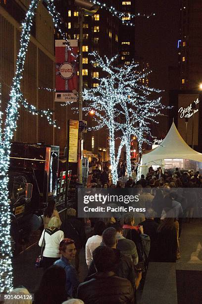 Invitees to the premiere of "Hateful Eight" stand on line along West 54th Street. At the premiere of his new film "Hateful Eight" at the historic...