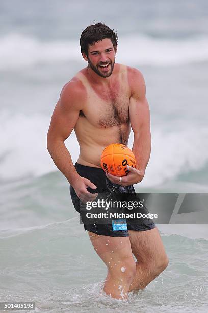 Levi Casboult of the Blues participates in a recovery session at the beach during the Carlton Blues AFL pre-season training camp on December 15, 2015...